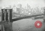 Image of Brooklyn Bridge and Williamsburg Bridge New York City USA, 1918, second 44 stock footage video 65675066758