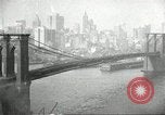 Image of Brooklyn Bridge and Williamsburg Bridge New York City USA, 1918, second 46 stock footage video 65675066758