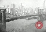 Image of Brooklyn Bridge and Williamsburg Bridge New York City USA, 1918, second 47 stock footage video 65675066758