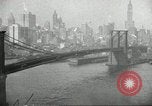 Image of Brooklyn Bridge and Williamsburg Bridge New York City USA, 1918, second 49 stock footage video 65675066758