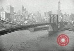 Image of Brooklyn Bridge and Williamsburg Bridge New York City USA, 1918, second 50 stock footage video 65675066758
