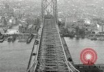 Image of Brooklyn Bridge and Williamsburg Bridge New York City USA, 1918, second 58 stock footage video 65675066758
