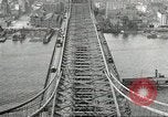 Image of Brooklyn Bridge and Williamsburg Bridge New York City USA, 1918, second 62 stock footage video 65675066758