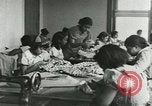 Image of African American women students sewing Charlotte North Carolina USA, 1937, second 22 stock footage video 65675066786