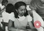 Image of African American women students sewing Charlotte North Carolina USA, 1937, second 24 stock footage video 65675066786