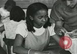 Image of African American women students sewing Charlotte North Carolina USA, 1937, second 28 stock footage video 65675066786