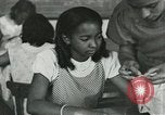 Image of African American women students sewing Charlotte North Carolina USA, 1937, second 30 stock footage video 65675066786