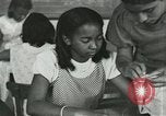 Image of African American women students sewing Charlotte North Carolina USA, 1937, second 33 stock footage video 65675066786