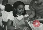 Image of African American women students sewing Charlotte North Carolina USA, 1937, second 35 stock footage video 65675066786