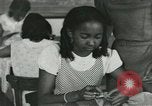 Image of African American women students sewing Charlotte North Carolina USA, 1937, second 38 stock footage video 65675066786