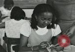 Image of African American women students sewing Charlotte North Carolina USA, 1937, second 39 stock footage video 65675066786