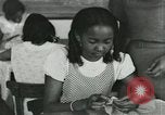 Image of African American women students sewing Charlotte North Carolina USA, 1937, second 40 stock footage video 65675066786