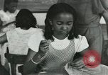 Image of African American women students sewing Charlotte North Carolina USA, 1937, second 43 stock footage video 65675066786