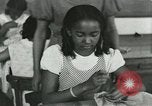 Image of African American women students sewing Charlotte North Carolina USA, 1937, second 44 stock footage video 65675066786