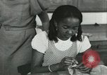 Image of African American women students sewing Charlotte North Carolina USA, 1937, second 45 stock footage video 65675066786
