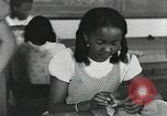 Image of African American women students sewing Charlotte North Carolina USA, 1937, second 46 stock footage video 65675066786