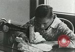 Image of African American women students sewing Charlotte North Carolina USA, 1937, second 50 stock footage video 65675066786