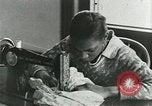 Image of African American women students sewing Charlotte North Carolina USA, 1937, second 52 stock footage video 65675066786