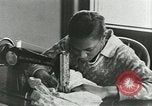 Image of African American women students sewing Charlotte North Carolina USA, 1937, second 55 stock footage video 65675066786