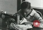 Image of African American women students sewing Charlotte North Carolina USA, 1937, second 62 stock footage video 65675066786