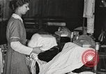 Immagine di Camicie stirato e riparata Chicago Illinois USA, 1917, secondo 58 filmato di repertorio 65675066830