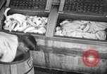 Image of commercial laundry operation and delivery early 1900s Chicago Illinois USA, 1917, second 3 stock footage video 65675066831