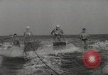 Image of water skiing stunt Amityville New York USA, 1936, second 11 stock footage video 65675066986