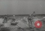Image of water skiing stunt Amityville New York USA, 1936, second 13 stock footage video 65675066986
