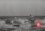 Image of water skiing stunt Amityville New York USA, 1936, second 15 stock footage video 65675066986