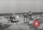 Image of water skiing stunt Amityville New York USA, 1936, second 17 stock footage video 65675066986