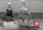 Image of water skiing stunt Amityville New York USA, 1936, second 18 stock footage video 65675066986