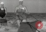 Image of water skiing stunt Amityville New York USA, 1936, second 19 stock footage video 65675066986