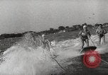 Image of water skiing stunt Amityville New York USA, 1936, second 27 stock footage video 65675066986