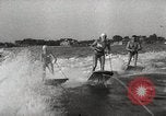 Image of water skiing stunt Amityville New York USA, 1936, second 28 stock footage video 65675066986