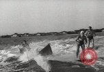 Image of water skiing stunt Amityville New York USA, 1936, second 33 stock footage video 65675066986