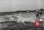 Image of water skiing stunt Amityville New York USA, 1936, second 34 stock footage video 65675066986