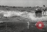 Image of water skiing stunt Amityville New York USA, 1936, second 36 stock footage video 65675066986