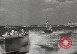 Image of water skiing stunt Amityville New York USA, 1936, second 40 stock footage video 65675066986