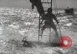 Image of water skiing stunt Amityville New York USA, 1936, second 46 stock footage video 65675066986