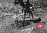 Image of water skiing stunt Amityville New York USA, 1936, second 48 stock footage video 65675066986