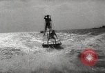 Image of water skiing stunt Amityville New York USA, 1936, second 50 stock footage video 65675066986