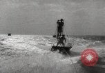 Image of water skiing stunt Amityville New York USA, 1936, second 51 stock footage video 65675066986