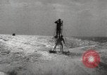 Image of water skiing stunt Amityville New York USA, 1936, second 52 stock footage video 65675066986