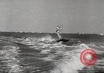 Image of water skiing stunt Amityville New York USA, 1936, second 54 stock footage video 65675066986