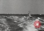 Image of water skiing stunt Amityville New York USA, 1936, second 55 stock footage video 65675066986