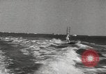 Image of water skiing stunt Amityville New York USA, 1936, second 56 stock footage video 65675066986