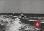 Image of water skiing stunt Amityville New York USA, 1936, second 58 stock footage video 65675066986