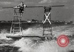 Image of water skiing stunt Amityville New York USA, 1936, second 59 stock footage video 65675066986