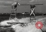 Image of water skiing stunt Amityville New York USA, 1936, second 60 stock footage video 65675066986