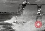 Image of water skiing stunt Amityville New York USA, 1936, second 62 stock footage video 65675066986